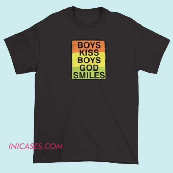 Boys Kiss Boys God Smiles T shirt A T-shirt featuring the phrase "Boys Kiss Boys, God Smiles," with a design that promotes love, acceptance, and positivity, often including symbolic imagery like hearts or rainbow colors.