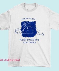 A T-shirt with a playful message combining traditional bedtime wishes with a modern reminder to stay aware and woke.
