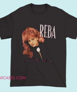 Reba T-shirt featuring a graphic of the country singer Reba McEntire's portrait and signature logo, perfect for fans of country music.