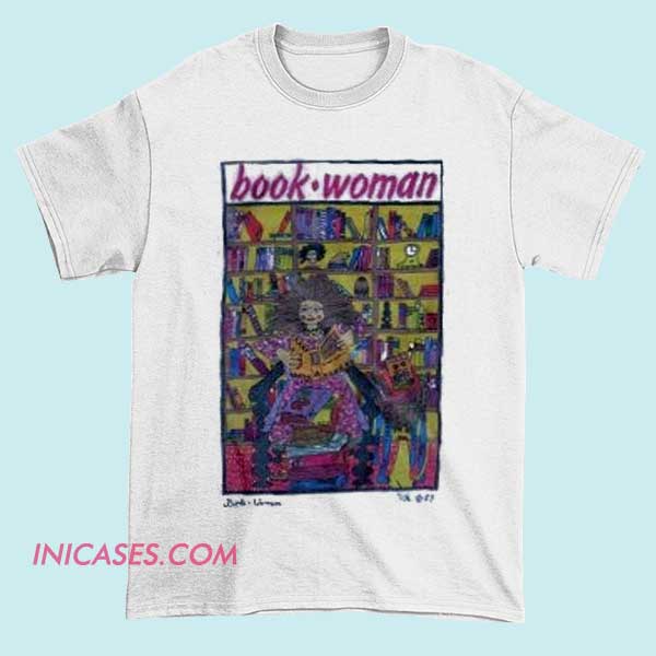 Book Woman T Shirt A T-shirt with a graphic of a woman reading a book, emphasizing a love for reading and literary culture.