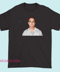 A T-shirt featuring an image or graphic related to Britney Spears' shaved head incident, possibly with bold text or iconic imagery referencing that moment in her career.