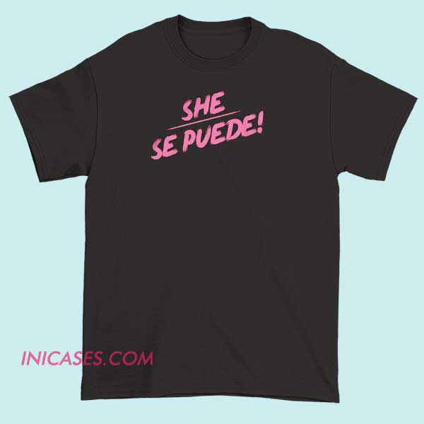 She Se Puede Logo T Shirt A T-shirt featuring the "She Se Puede" logo, showcasing bold text and design elements that promote empowerment and motivation for women.