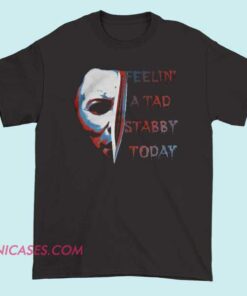 A T-shirt with the phrase "Feeling a tad stabby today" displayed prominently, conveying a humorous or playful mood.