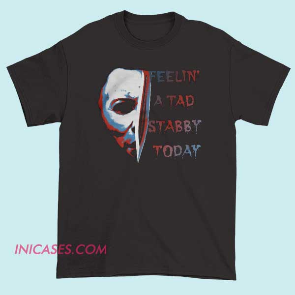 Feeling a tad stabby today T shirt A T-shirt with the phrase "Feeling a tad stabby today" displayed prominently, conveying a humorous or playful mood.