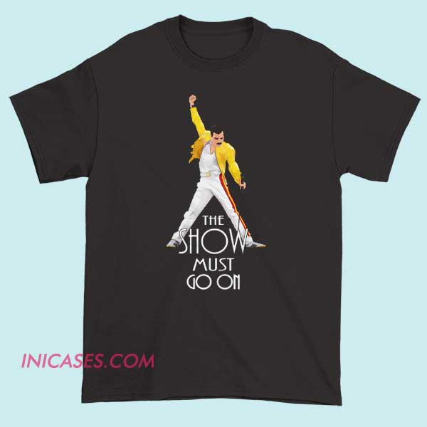 The show must go on T Shirt A T-shirt with the phrase "The show must go on" printed on it, featuring bold typography, theatrical or stage-inspired design elements, suitable for performers or fans of live entertainment.