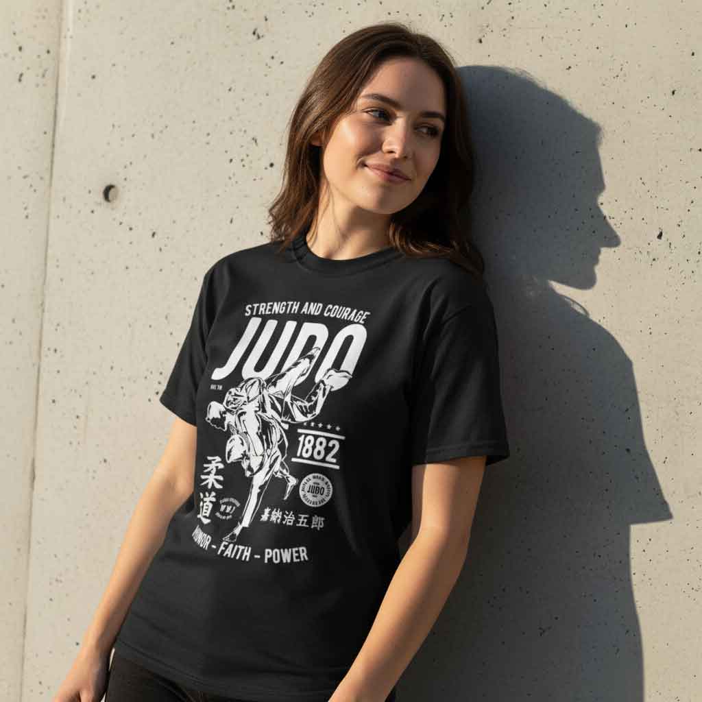 1882 Strength and Courage Judo Silencer T Shirt 1882 Strength and Courage Judo Silencer T shirt featuring bold martial arts typography inspired by judo philosophy, combat sports heritage, discipline, resilience, dojo culture, and grappling warrior mindset apparel