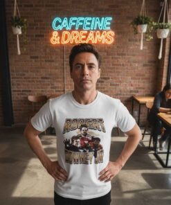Robert Downey Syndrome Graphic Photo Shirt Robert Downey Syndrome graphic photo shirt featuring a bold parody-style celebrity inspired image, combining meme culture, pop culture humor, and expressive graphic tee design for casual streetwear fans.