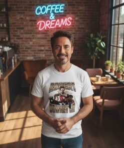 Robert Downey Syndrome Graphic Photo Shirt Robert Downey Syndrome graphic photo shirt featuring a bold parody-style celebrity inspired image, combining meme culture, pop culture humor, and expressive graphic tee design for casual streetwear fans.