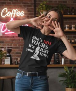 Funny Workout She's Not Yours Shirt Funny workout “She’s Not Yours” gym shirt with bold typography, savage fitness humor t-shirt for gym lovers, weightlifting fans, bodybuilding style, casual streetwear fitness apparel