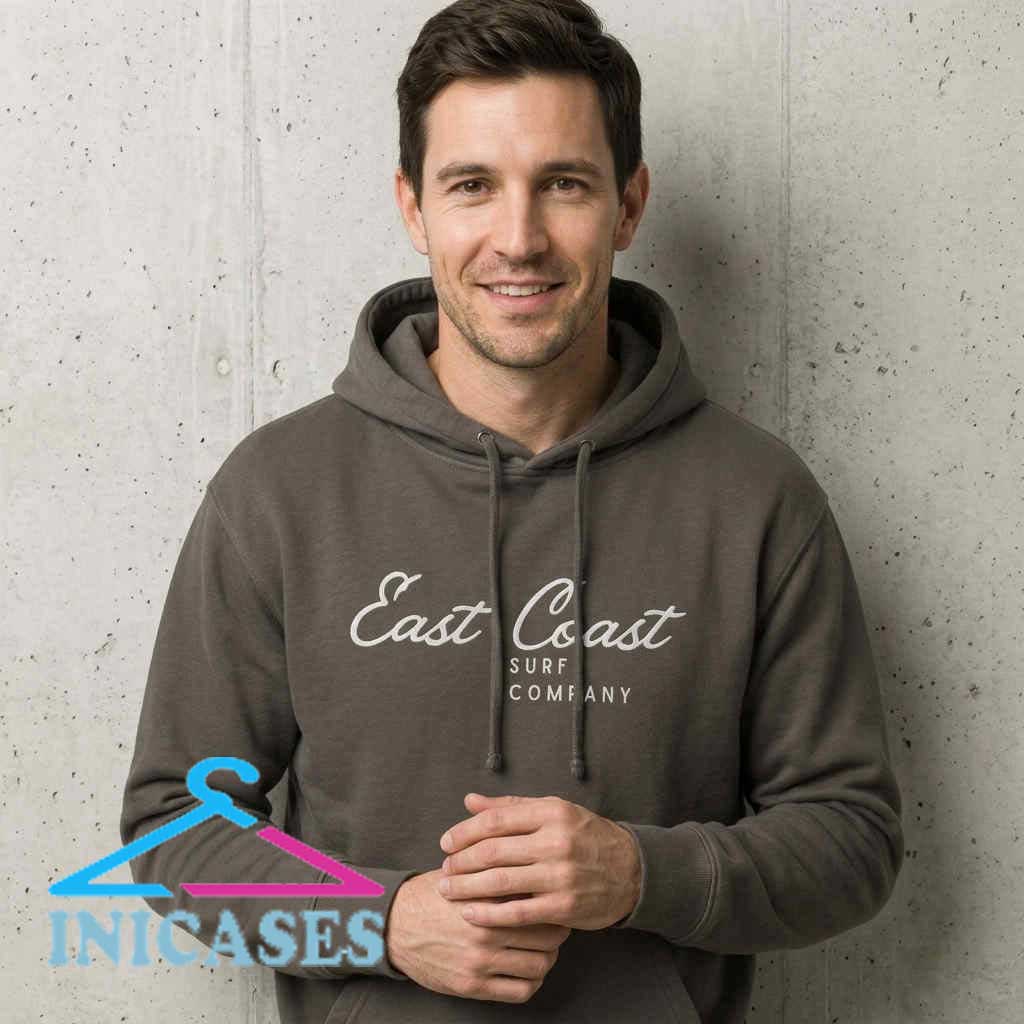 East Coast Surf Company Hoodie Graphic East Coast Surf Patrol Vintage Graphic T Shirt featuring retro coastal artwork on soft cotton fabric, beach lifestyle apparel, surf inspired graphic tee, casual summer streetwear.