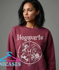 Hogwarts Harry Potter Crest Maroon Graphic Sweatshirt featuring a classic wizard school crest on soft cotton fabric, fantasy inspired apparel, magical graphic clothing, casual fan fashion.