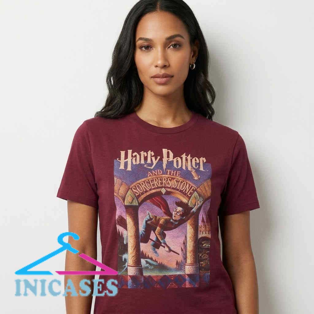 Vintage Harry Potter Sorcerer's Stone Maroon Graphic T-Shirt Vintage Harry Potter Sorcerer's Stone graphic shirt featuring retro wizard inspired artwork on soft cotton. Magical fantasy tee for Harry Potter fans, collectors, and everyday casual wear.