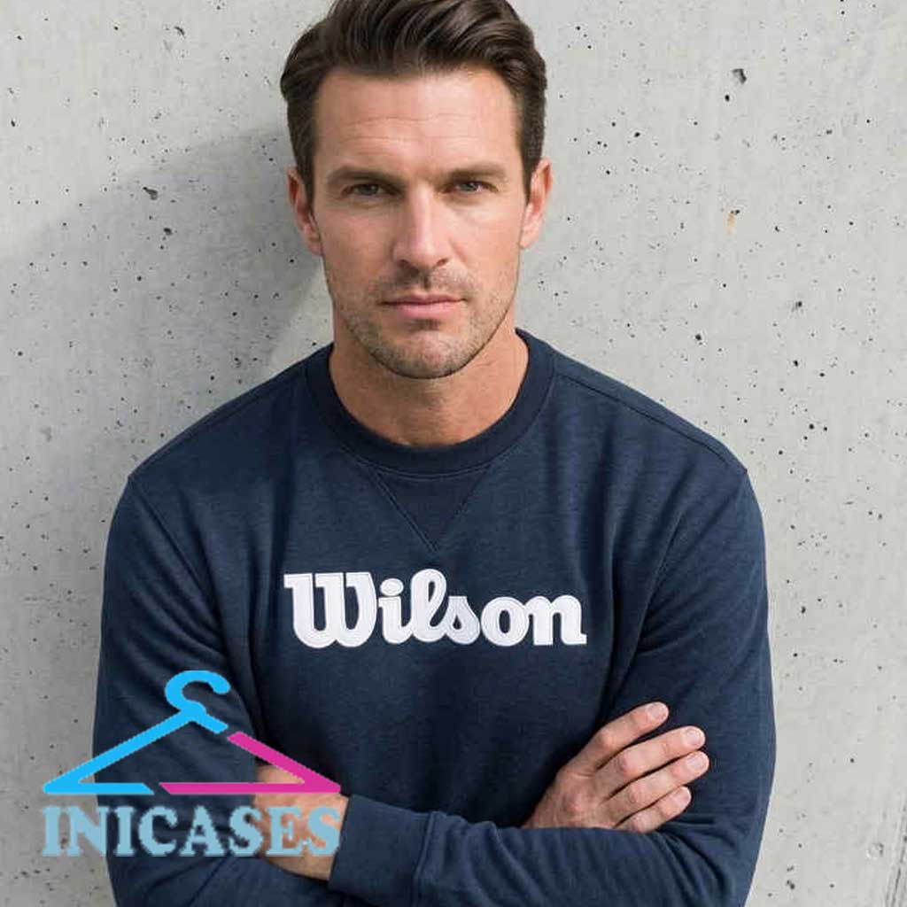 Wilson Classic Logo Navy Crewneck Sweatshirt Wilson Classic Logo navy crewneck sweatshirt with a clean graphic design, cotton material, casual athletic style, and versatile everyday appeal for sizes S to 2XL.