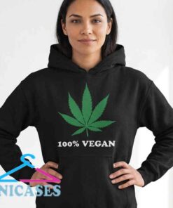100% Vegan cannabis leaf black hoodie with graphic design, cotton fabric, casual streetwear style, plant-inspired apparel for eco-conscious fashion fans.