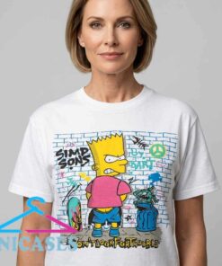 homepage Vintage 90s Bart Simpson graffiti graphic T-shirt featuring cartoon artwork on a brick wall design, retro cotton short sleeve tee for nostalgic streetwear and animation fans