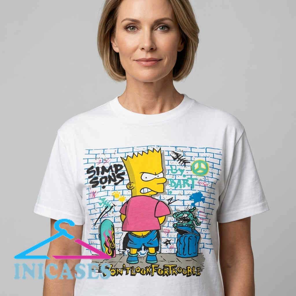 Vintage 90s Bootleg Bart Simpson Graffiti Brick Wall Tee Vintage 90s Bart Simpson graffiti graphic T-shirt featuring cartoon artwork on a brick wall design, retro cotton short sleeve tee for nostalgic streetwear and animation fans